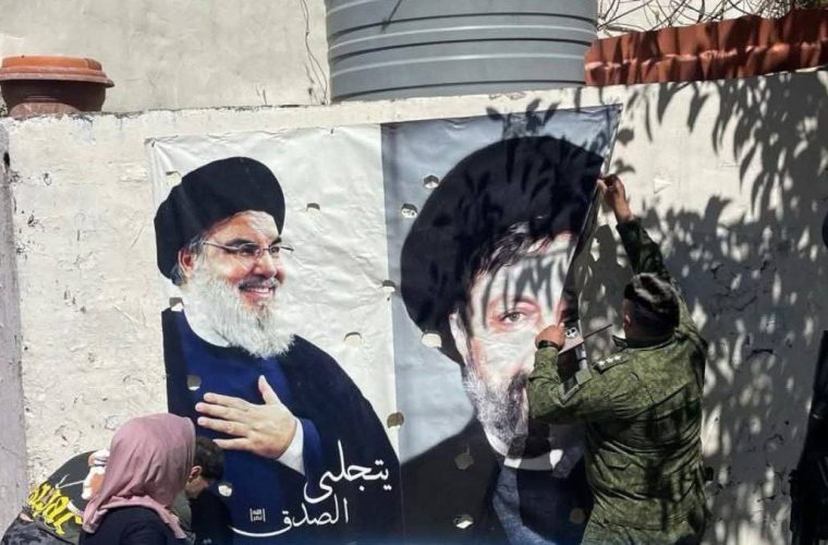 جمع آوری تصاویر سیدحسن نصرالله و پرچم های حزب الله از خیابان های لبنان+تصاویر